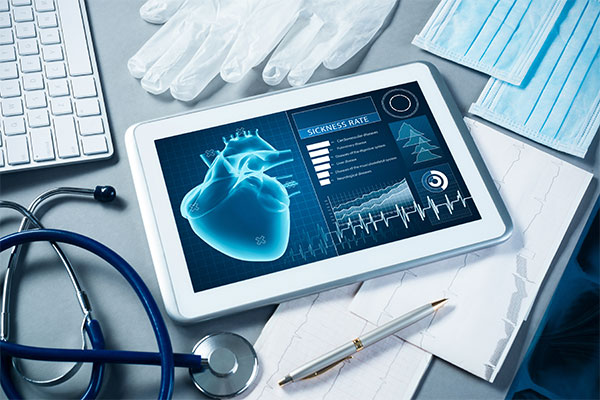 desk with stethoscope and tablet of healthcare ui